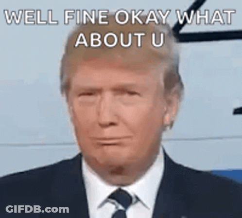 Man In Suit And Tie Making Funny Face GIF