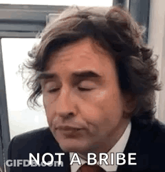 Man In Suit And Tie Making Funny Face Not A Bribe GIF