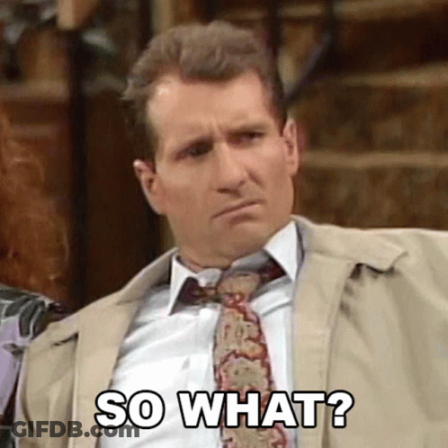 Man In Suit And Tie Making Funny Face GIF