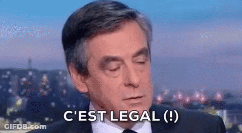 Man In Suit And Tie Making Funny Face Saying C'est Legal GIF