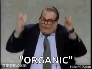 Man In Suit And Tie Making Funny Face Saying Organic GIF