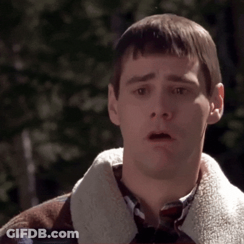 Man In Suit And Tie Making Funny Face GIF