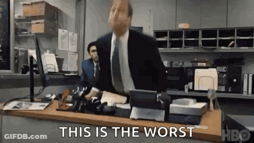 Man In Suit And Tie Making Funny Face GIF