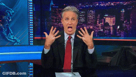 Man In Suit And Tie Making Shocked Face GIF
