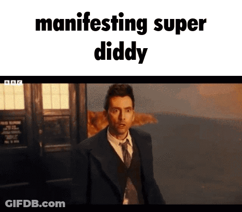 Man In Suit And Tie Manifesting Super Diddy GIF