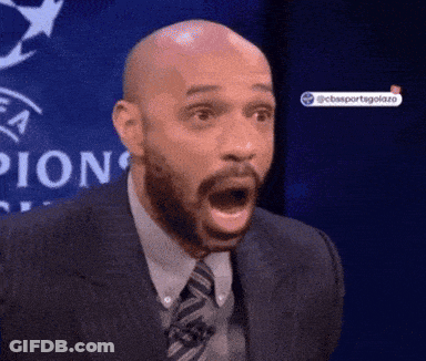 Man In Suit And Tie Mouth Open Saying Pion GIF