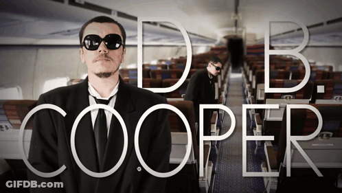 Man In Suit And Tie Named DB Cooper GIF