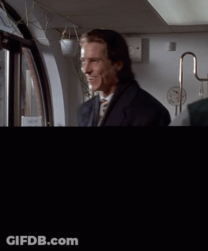 Man In Suit And Tie Near Do Not Touch Sign GIF