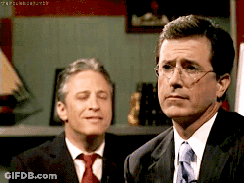 Man In Suit And Tie Next To Another Man GIF