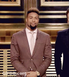 Man In Suit And Tie Next To Another Man GIF