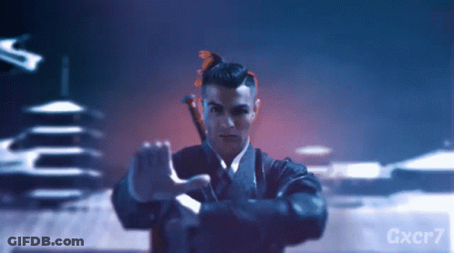 Man In Suit And Tie Next To Gxcr7 Sign GIF