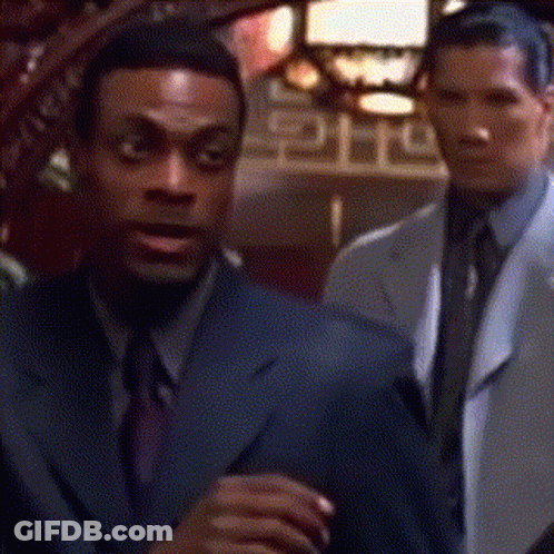 Man In Suit And Tie Next To Man GIF