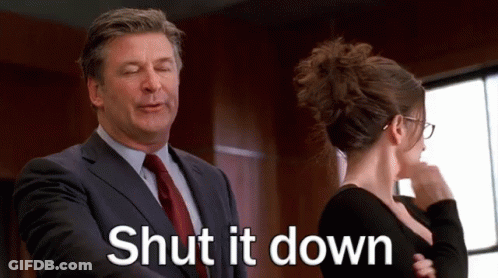 Man In Suit And Tie Next To Woman In Black Dress GIF