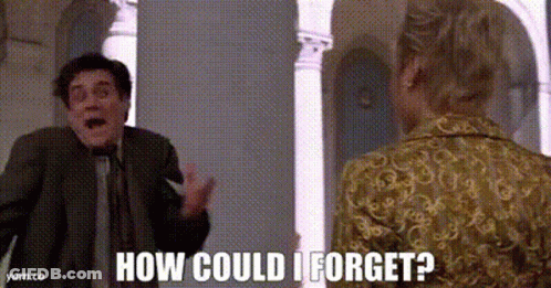 Man In Suit And Tie Next To Woman In Dress GIF