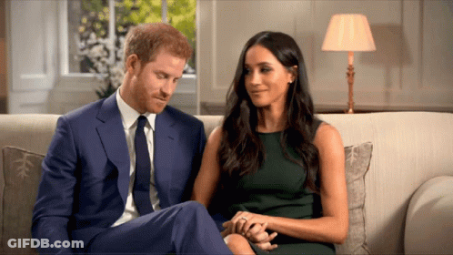 Man In Suit And Tie Next To Woman In Green Dress GIF
