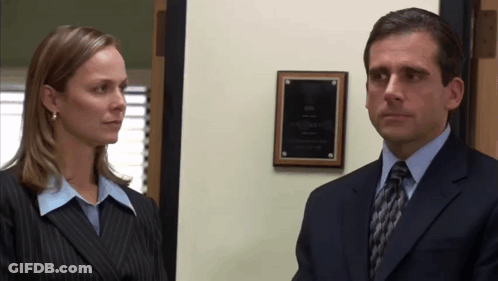 Man In Suit And Tie Next To Woman GIF