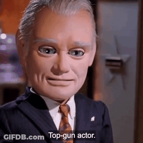 Man In Suit And Tie On Being Top Gun Actor GIF