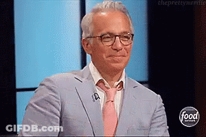 Man In Suit And Tie On Food Network GIF