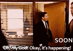 Man In Suit And Tie On Phone At Door GIF