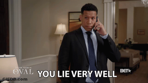 Man In Suit And Tie On Phone Saying You Lie Very Well GIF