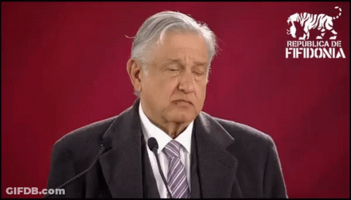 Man In Suit And Tie On Red Background Saying Republica De Fiidonia GIF