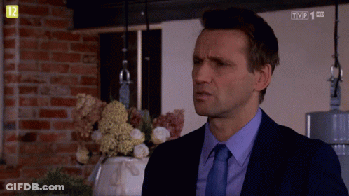 Man In Suit And Tie On TVP1 HD GIF
