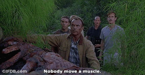 Man In Suit And Tie Outstretched Arms Crowd GIF