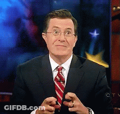 Man In Suit And Tie Pointing GIF