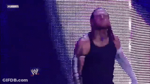 Man In Suit And Tie Pointing GIF