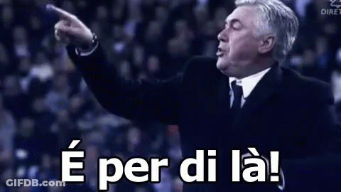 Man In Suit And Tie Pointing Saying E Per Di La GIF