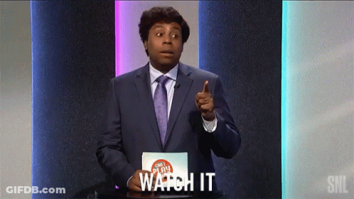 Man In Suit And Tie Pointing Saying Watch It GIF
