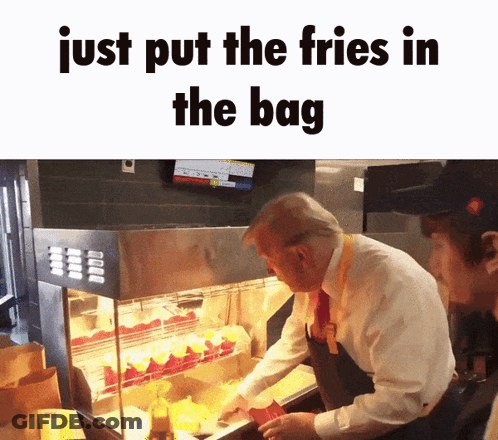 Man In Suit And Tie Putting French Fries Into Bag GIF
