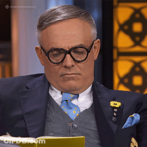 Man In Suit And Tie Reading Book #Cbcdragonsden GIF