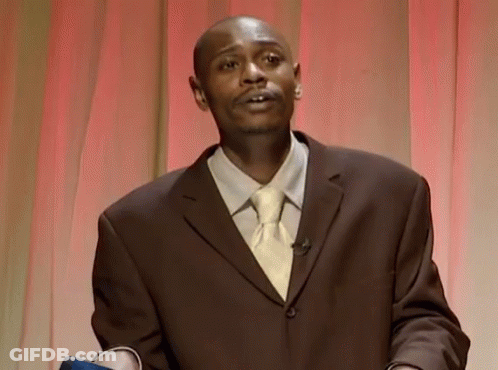 Man In Suit And Tie Red Curtain GIF