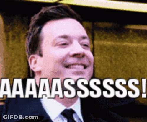 Man In Suit And Tie Saying Aaaasssssi GIF