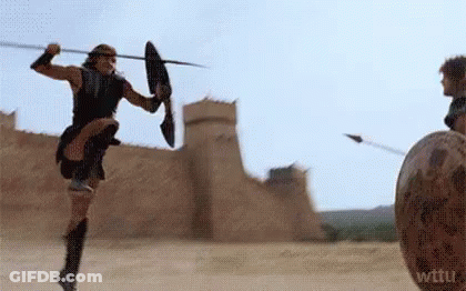 Man In Suit And Tie Saying Achilles Irl GIF
