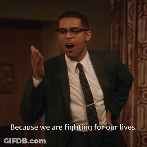 Man In Suit And Tie Saying Because We Are Fighting For Our Lives GIF