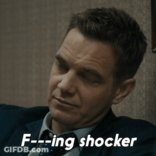 Man In Suit And Tie Saying F-Ing Shocker GIF