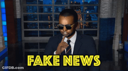 Man In Suit And Tie Saying Fake News GIF