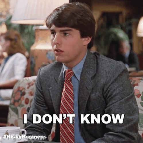 Man In Suit And Tie Saying I Don't Know GIF