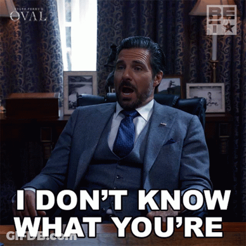 Man In Suit And Tie Saying I Don't Know GIF