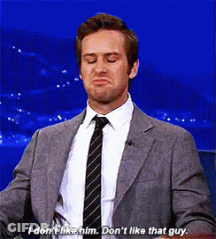 Man In Suit And Tie Saying I Don't Like Him GIF