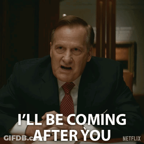 Man In Suit And Tie Saying I'll Be Coming After You GIF
