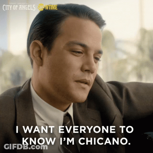 Man In Suit And Tie Saying I M Chicano GIF