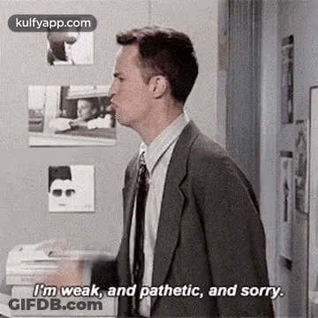 Man In Suit And Tie Saying I'm Weak And Pathetic And Sorry GIF