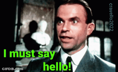 Man In Suit And Tie Saying I Must Say Hello GIF