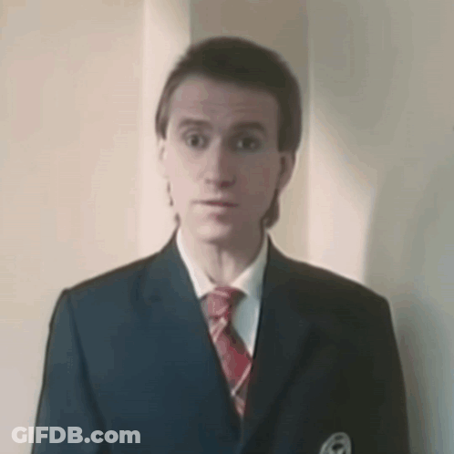Man In Suit And Tie Saying I Was Up Here GIF