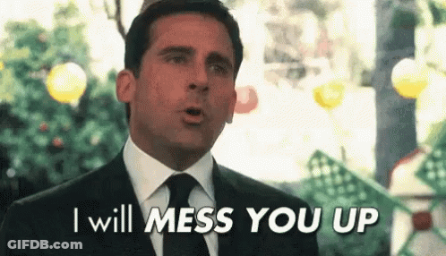Man In Suit And Tie Saying I Will Mess You Up GIF
