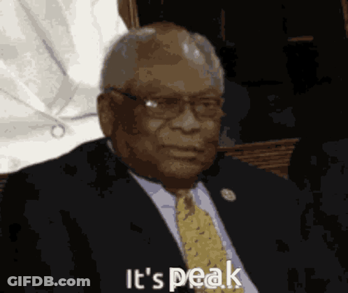Man In Suit And Tie Saying It's Peak GIF