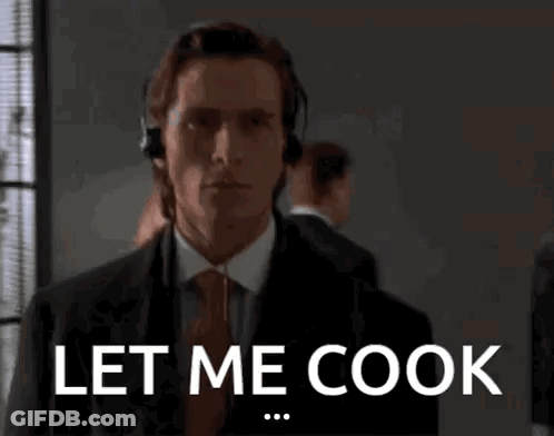 Man In Suit And Tie Saying Let Me Cook GIF